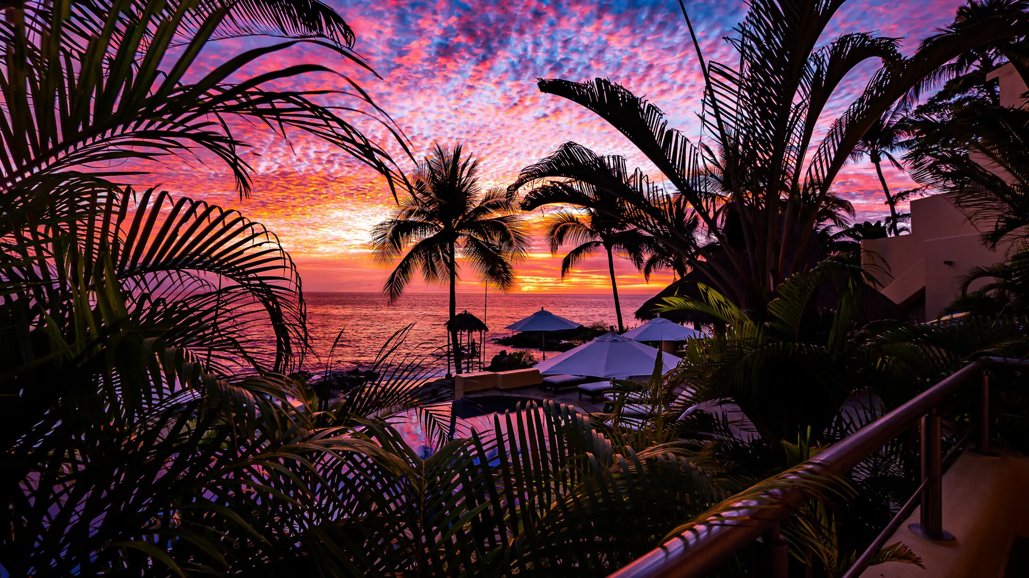 Sunset in Puerto Vallarta and infinity swimming pool with hot tub