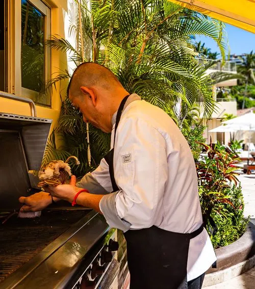 Grilling at Villa Montecito by the pool